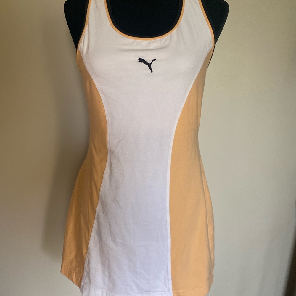 Puma tennis dress with a built in bra. Super comfy and no rips or stains!